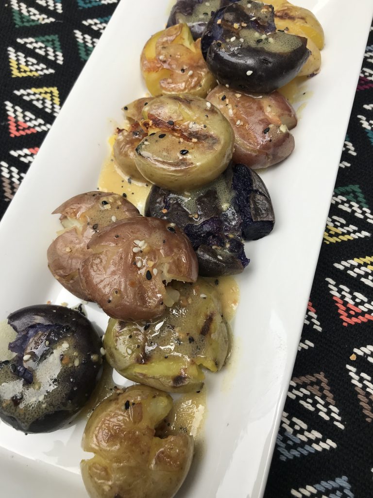 smashed tri-color potatoes topped with honey mustard and seasoning