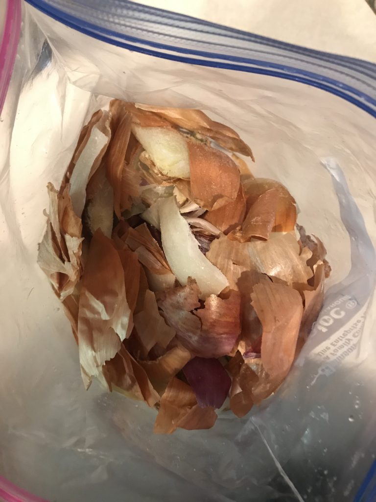 A open bag of frozen vegetable scraps