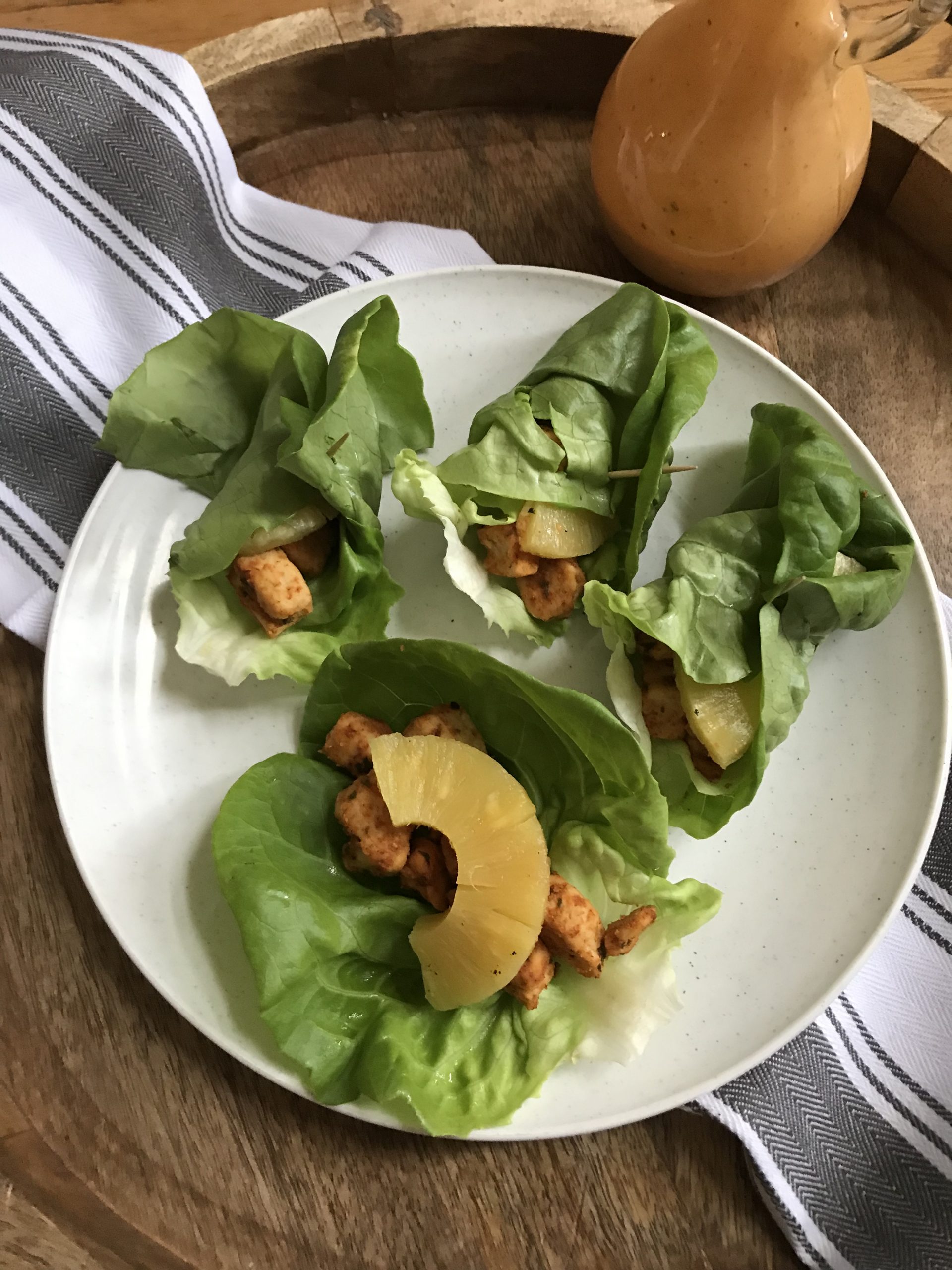 lettuce wraps with quorn and sliced pineapple