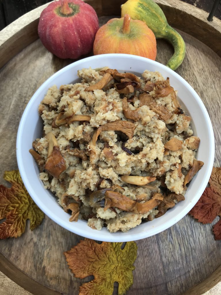 a casserole dish full of chanterelle stuffing