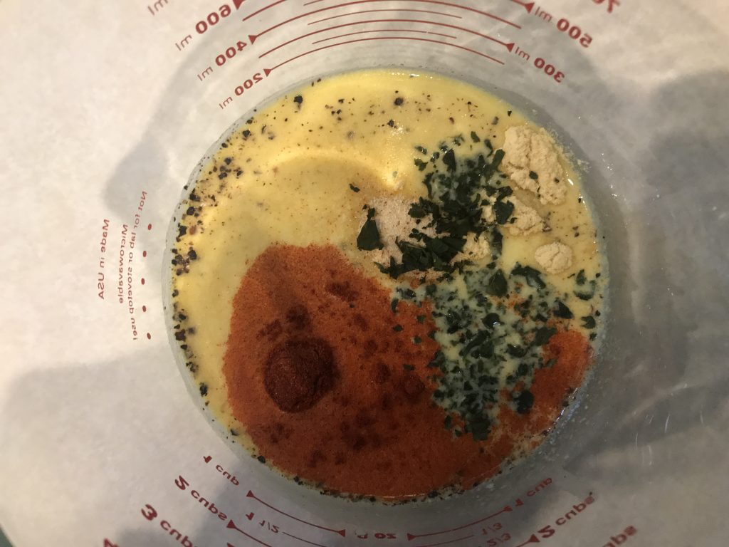 a mix of just egg , paprika, pepper, and basil