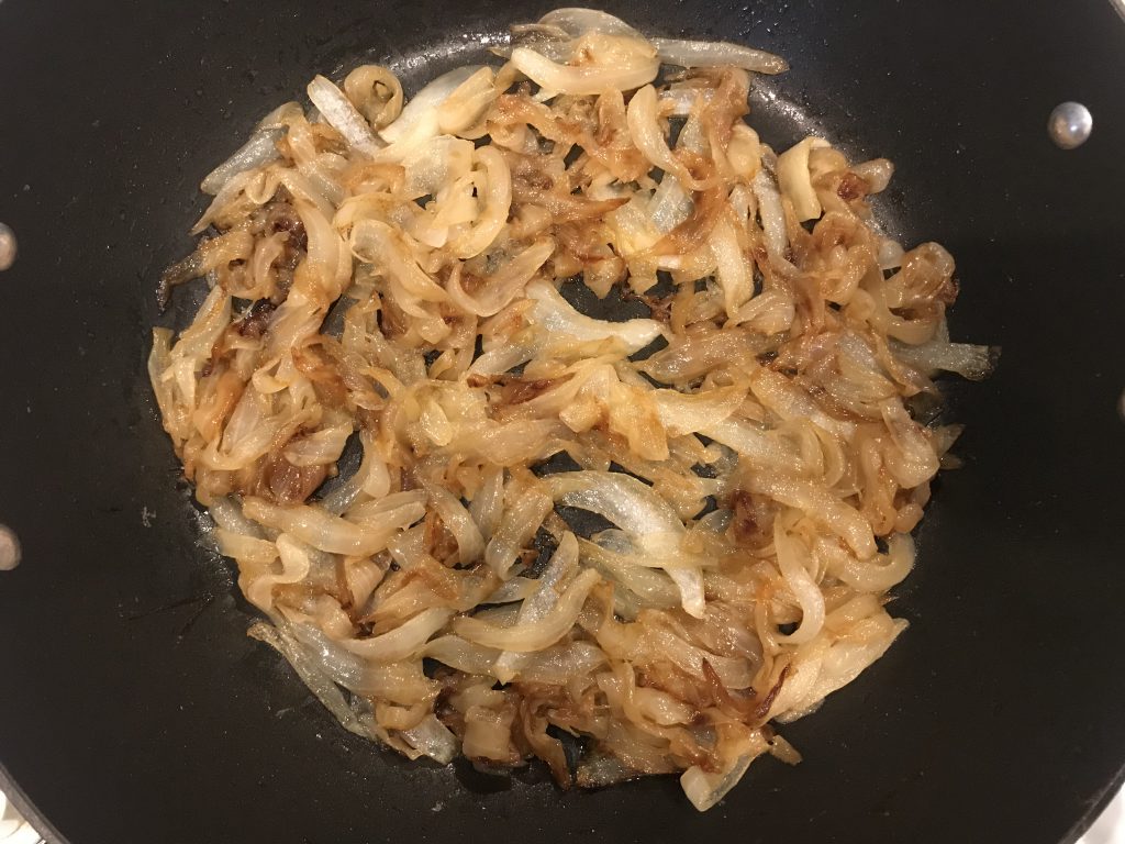 onions that are half way to being caramelized, lightly brown