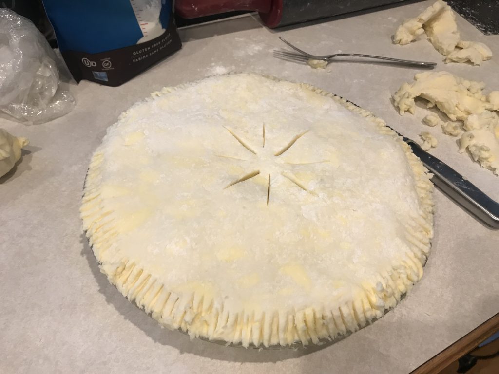 the uncooked pot pie with the top pastry with slits in the top